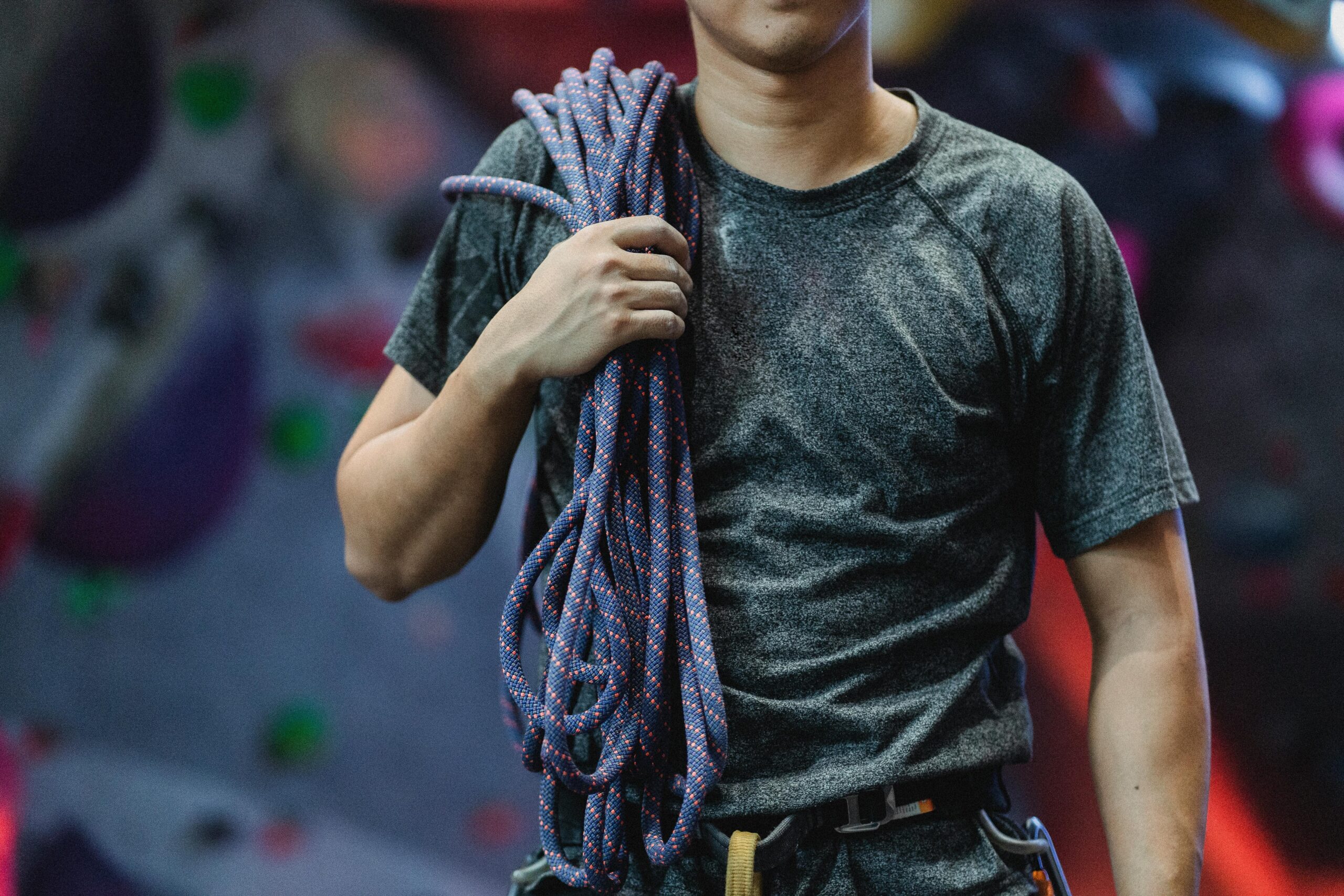 A well-flaked climbing rope laid out on the ground for inspection