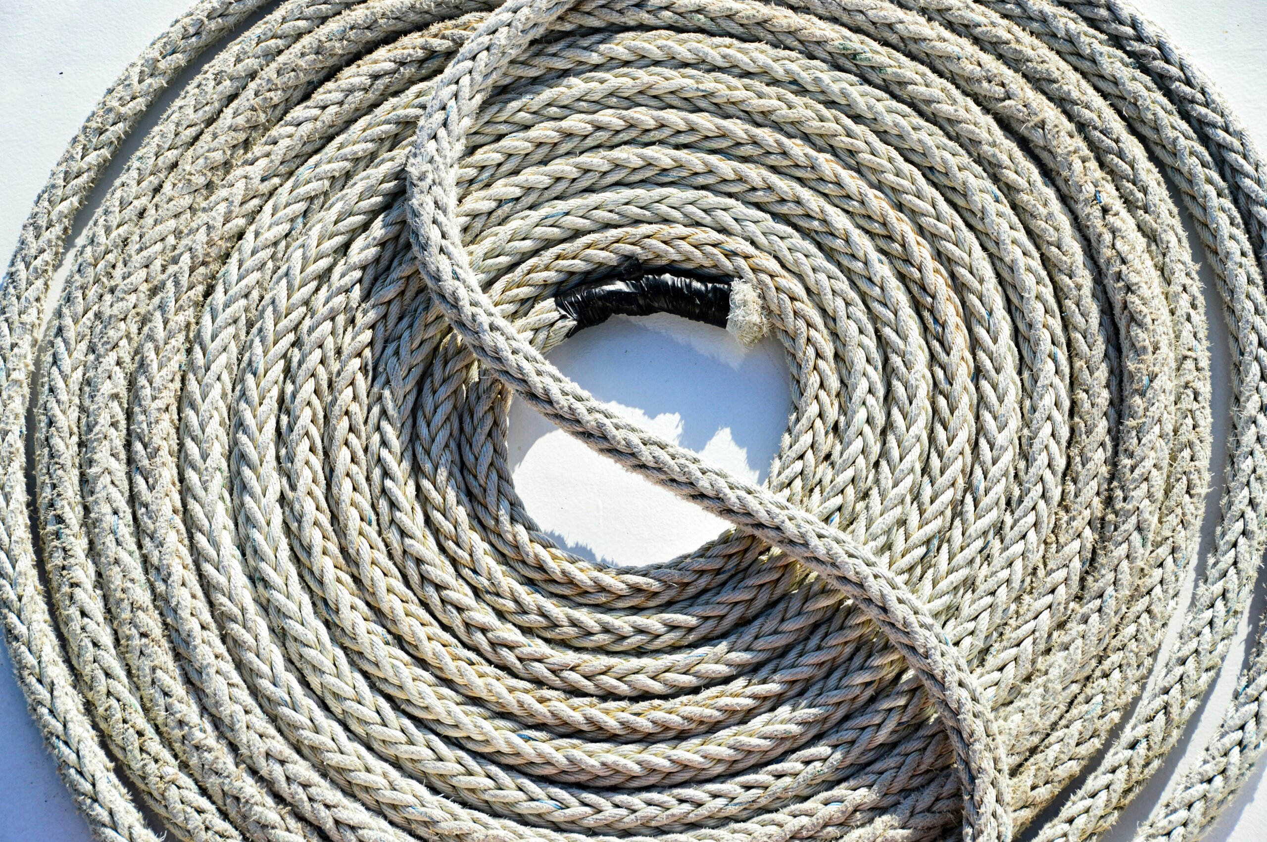 climber using belay device