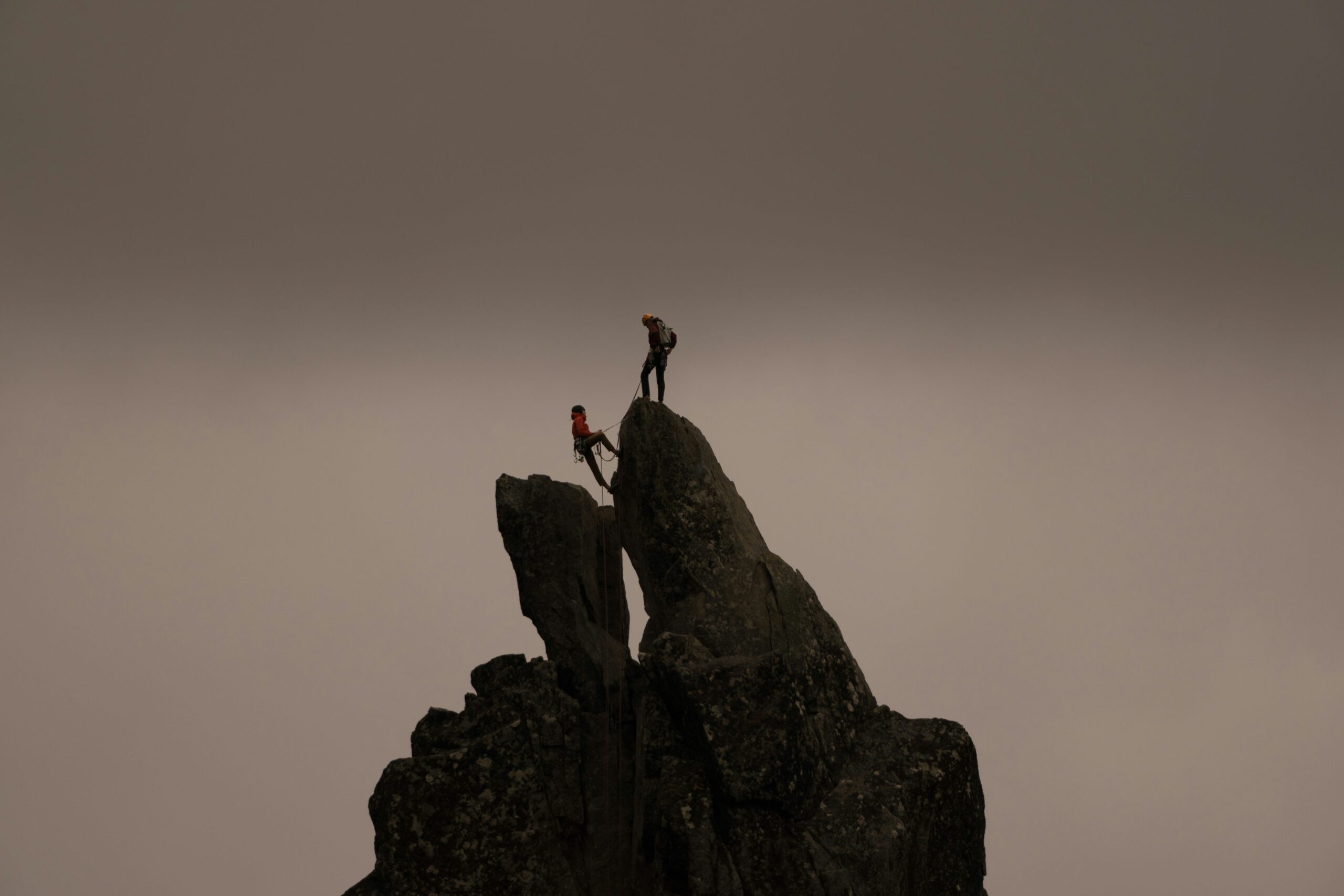 Group climbers practicing secure climb training
