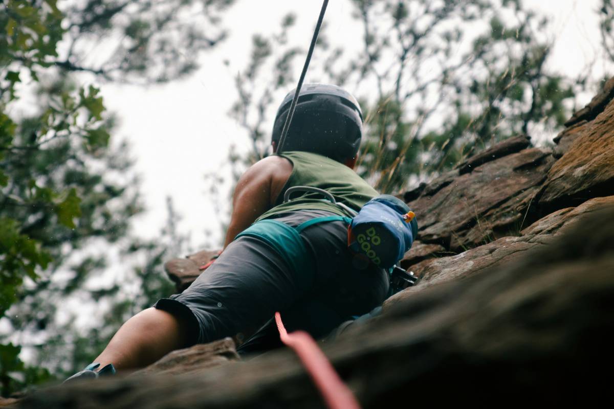 Demonstration of correct setup for a climbing belay device