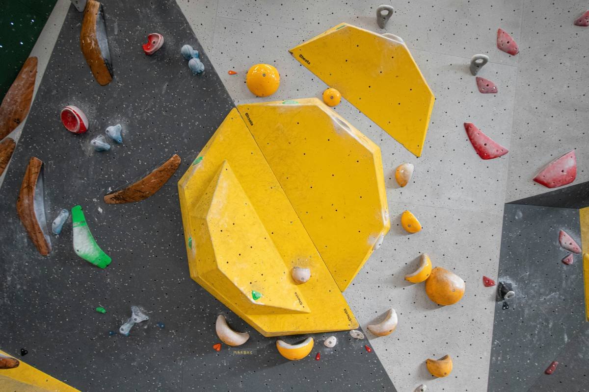 Diagram showing correct rope path through a Petzl GriGri+ mounted on dual anchors in a home climbing wall setup